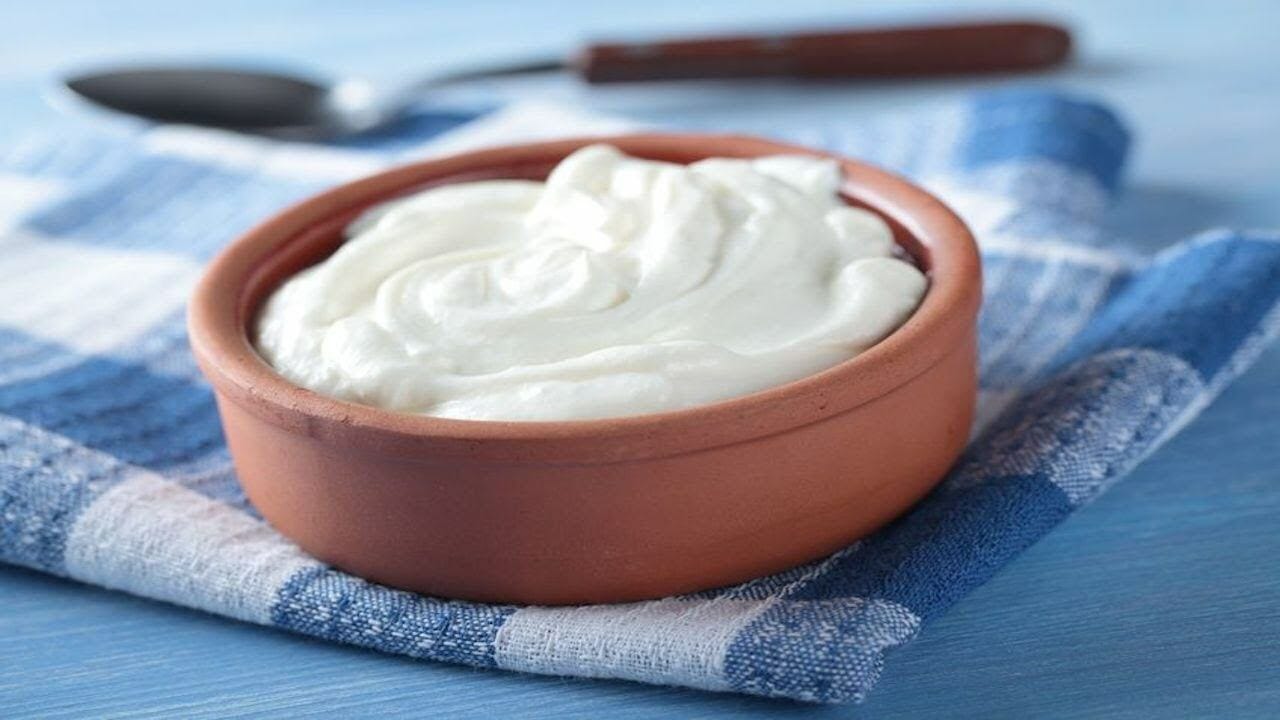 Greek yogurt in a clay bowl