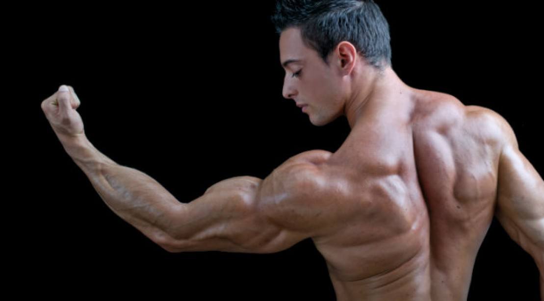 Man looking at his biceps