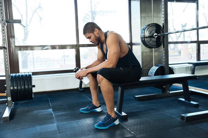 Man resting at a gym