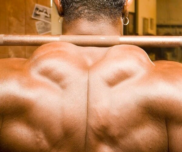 Man showing his back muscles