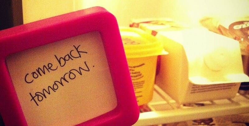 A sign on a fridge saying: Come back tomorrow
