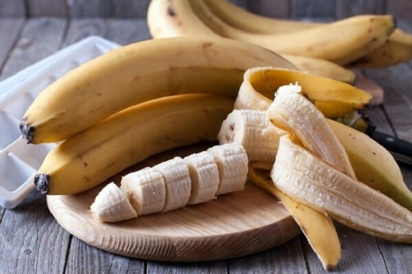 Whole and sliced bananas on board