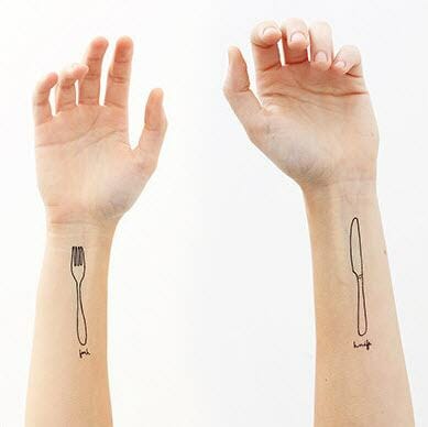 Fork and spoon tatoo on arms