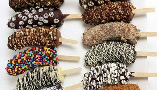 Frozen banana treats with different type of sprinkles