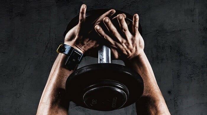 Guy holding weight with both hands