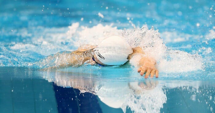 Man swimming in a pool