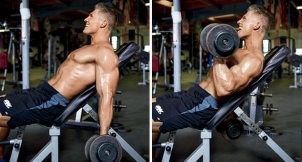 Man showing how to perform incline dumbbell curls