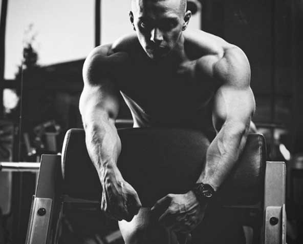 Man in a gym in black and white