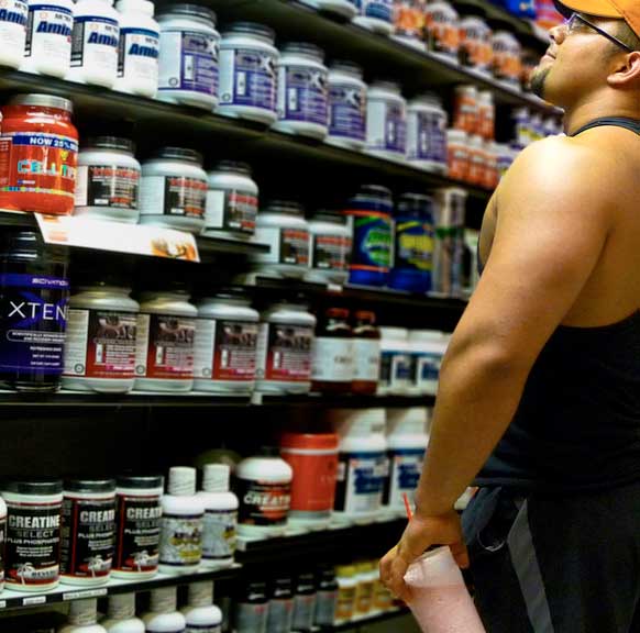 man shopping for supplements