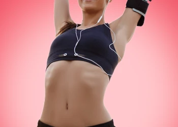 A fit person lifting hands up
