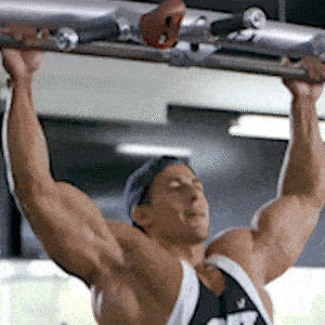 A person doing a wide grip chin up
