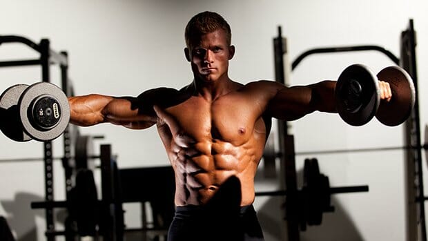 Lateral-Raises Man doing lateral raises workout