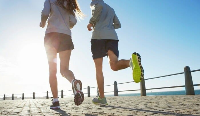 Couple walking on a boardwalk