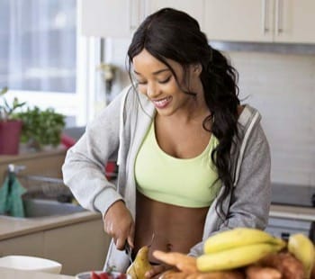 fit lady preparing meal