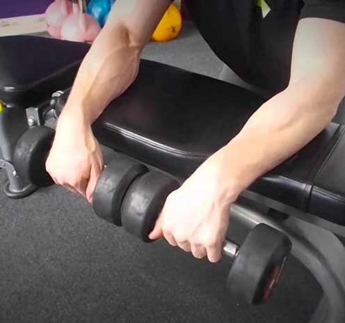 ​​​Palms-Down Dumbbell Wrist Curl