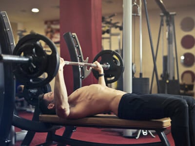 man-doing-benchpress