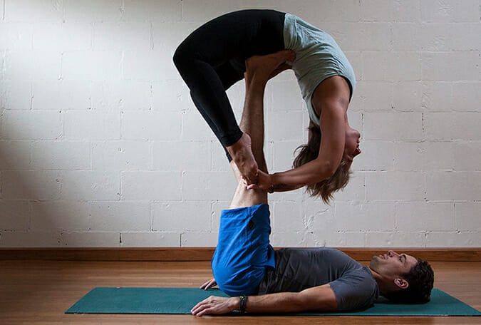 People doing Acroyoga