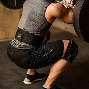 A man using supportive belt in his workout