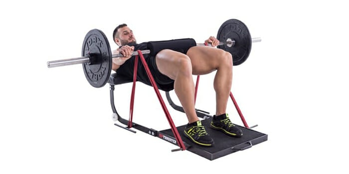 man-doing-barbell-bridge-exercise