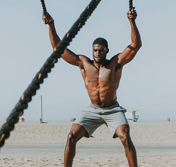 man doing cable workout