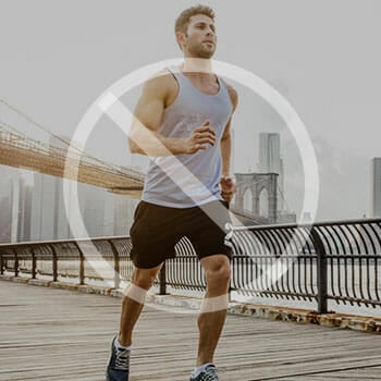 A man running with a cross over him