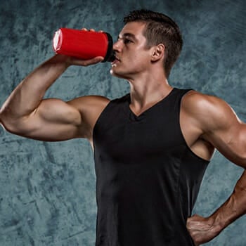 Man Drinking Supplements