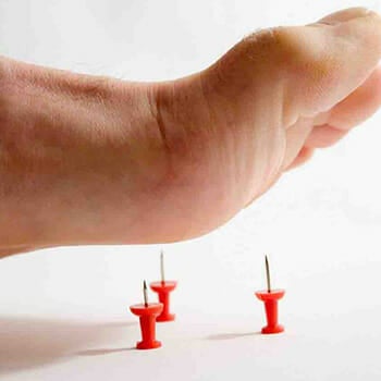 pins under foot