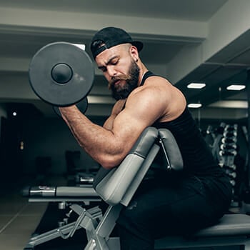 Men in the Gym working out