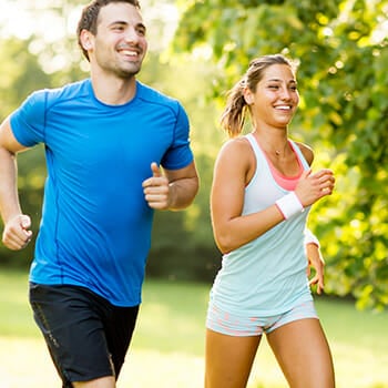man and woman jogging