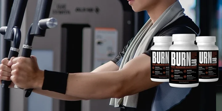 A close up shot of a man working out in a gym with Burn Lab Pro supplements on the side