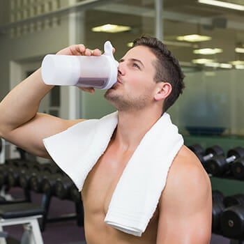 man-drinking-protein-powder