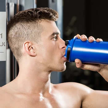 a man drinking some protein shake