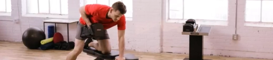 Man doing workout using PowerBlock elite