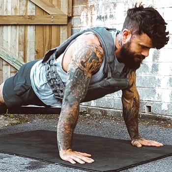 A person using weight vest for push ups