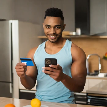 Fit Man holding Smart Phone