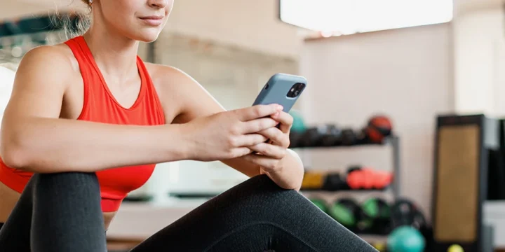 Woman using Pact App for work out