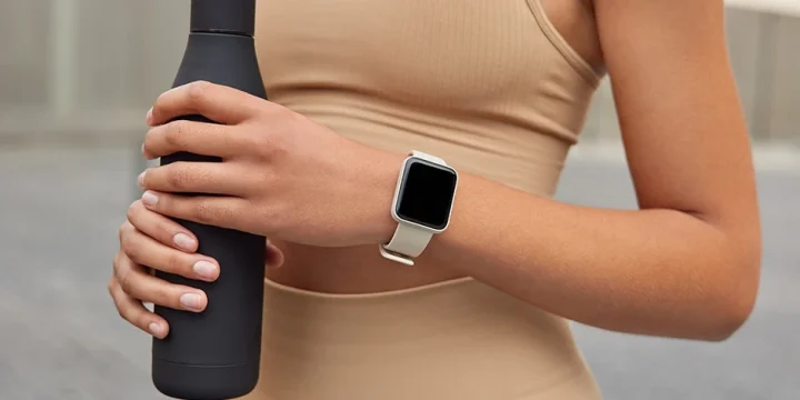 A woman with small wrists wearing the best fitness tracker