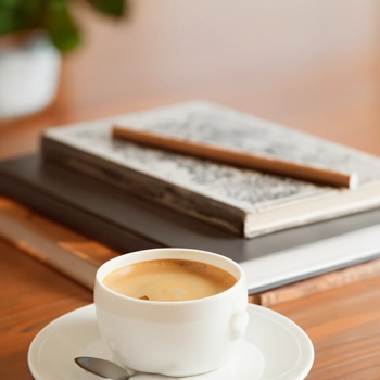 Book and coffee on a table