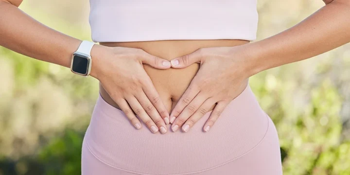 A woman taking the best digestive enzymes