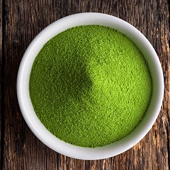 Top view of green tea extract in a bowl