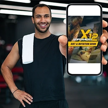A man holding a phone displaying diet modules from Superhero X12