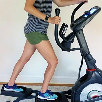 A person using Schwinn 470 Elliptical with resistance level variety