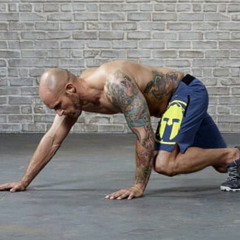 man doing bear crawl exercise