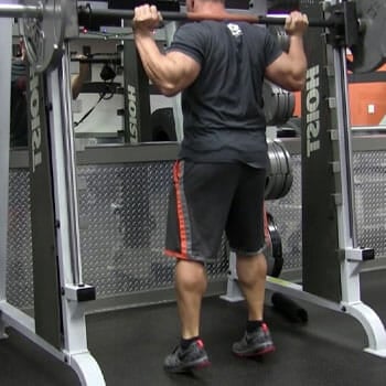 standing calf raises in the gym