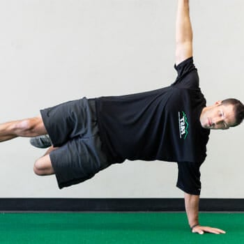 man doing a side plank