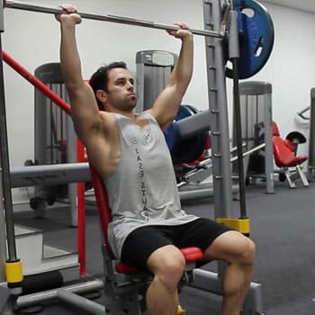 seated overhead shoulder press using a smith machine