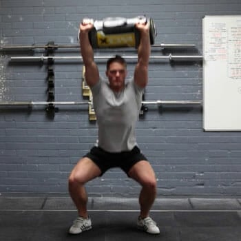 snatch exercise with a sandbag