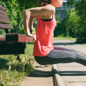 woman doing tricep dips