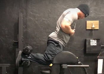 A muscular man doing his workout
