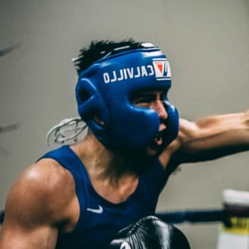 man boxing with a headgear